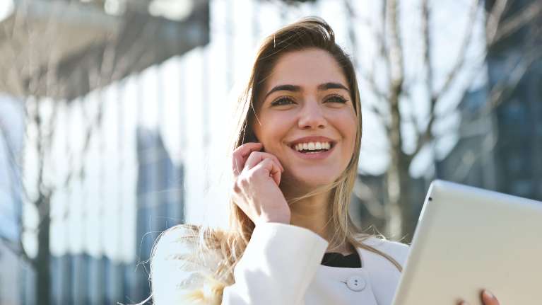 A smiling woman on the phone, nashville tn