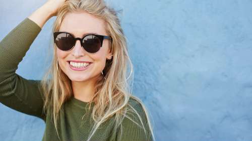 Blonde woman with sunglasses smiling, brentwood tn