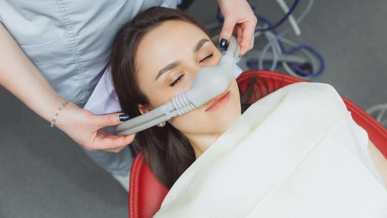 Woman undergoing dental sedation in Brentwood, TN